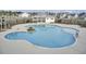 A resort-style pool with beach entry, a central island with palm tree, and a covered clubhouse in a beautiful community at 490 Pender Woods Dr, Summerville, SC 29486