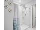 Ensuite bathroom featuring a modern shower with tile surround and recessed lighting at 493 Spanish Wells Rd, Summerville, SC 29486