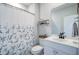 Cozy bathroom featuring floral shower curtain, white vanity and modern sink at 493 Spanish Wells Rd, Summerville, SC 29486