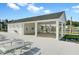 Exterior of the community clubhouse with bathrooms and showers by the pool with lots of lounge chairs at 493 Spanish Wells Rd, Summerville, SC 29486