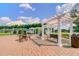 Charming community space featuring pergolas, seating, and a brick-paved area for residents to enjoy the outdoors at 493 Spanish Wells Rd, Summerville, SC 29486