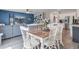 Open concept view of the dining area showcasing the kitchen and living room at 493 Spanish Wells Rd, Summerville, SC 29486