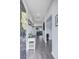 Welcoming foyer with wood floors and a view into the living room at 493 Spanish Wells Rd, Summerville, SC 29486
