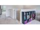 Upstairs hallway with custom shelving at 493 Spanish Wells Rd, Summerville, SC 29486