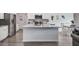 Modern kitchen with granite countertops, stainless steel appliances and a large island at 493 Spanish Wells Rd, Summerville, SC 29486