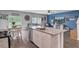 Open-concept kitchen with granite countertops and views to the living room at 493 Spanish Wells Rd, Summerville, SC 29486