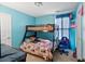 This cozy bedroom features a bunk bed, a desk, and a gaming chair at 4938 Ballantine Dr, Summerville, SC 29485