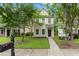 Charming home with neat front yard, complemented by lush trees and landscaping at 4938 Ballantine Dr, Summerville, SC 29485