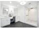 Bright bathroom featuring a large walk-in shower and vanity with a checkered chair at 51 Stocker Dr, Charleston, SC 29407