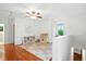 Bright bonus room with hardwood floors, ceiling fan, and natural light from the window at 51 Stocker Dr, Charleston, SC 29407