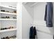 Organized walk-in closet with shelving and hanging space for shoes and clothing at 51 Stocker Dr, Charleston, SC 29407
