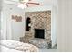 Bedroom fireplace with brick surround and an arched alcove, providing a cozy focal point at 51 Stocker Dr, Charleston, SC 29407