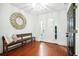 Elegant foyer with hardwood floors, a decorative mirror, and ample natural light at 51 Stocker Dr, Charleston, SC 29407