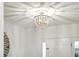Close up of foyer chandelier and front door at 51 Stocker Dr, Charleston, SC 29407
