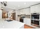 Updated kitchen with stainless steel appliances, quartz counters, and ample cabinet space at 51 Stocker Dr, Charleston, SC 29407