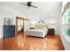 Bright main bedroom with hardwood floors, large windows, and stylish furniture at 51 Stocker Dr, Charleston, SC 29407