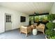 Relaxing screened-in patio with comfortable seating and natural light, perfect for outdoor enjoyment at 51 Stocker Dr, Charleston, SC 29407