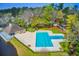 Aerial view of a sparkling community pool with an ample sundeck and lounge area, perfect for relaxation at 5133 Park Creek Ave, North Charleston, SC 29418