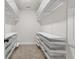 A walk-in closet features adjustable shelving, drawers, and ample storage for an organized wardrobe at 5133 Park Creek Ave, North Charleston, SC 29418