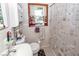 Bathroom with decorative shower curtain, vanity and commode at 5209 Sterrett St, North Charleston, SC 29405
