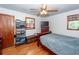 Bright bedroom features wood floors, a ceiling fan and closet for storage at 5209 Sterrett St, North Charleston, SC 29405