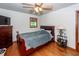 Bedroom with wood floors, ceiling fan and view to the backyard at 5209 Sterrett St, North Charleston, SC 29405