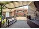 Outdoor patio area with bench and storage at 5209 Sterrett St, North Charleston, SC 29405