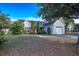 Charming single-story home with an attached garage and neatly kept lawn and landscaping at 5217 Copley Cir, Summerville, SC 29485