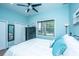 Bedroom with a white bed, dark colored dresser, and blue walls at 544 Two Mile Run, Johns Island, SC 29455
