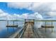 Beautiful dock with a covered gazebo extending into calm waters, a serene spot for waterfront enjoyment at 544 Two Mile Run, Johns Island, SC 29455