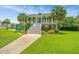 Charming two-story home with a landscaped yard, inviting staircase, and a picturesque view at 544 Two Mile Run, Johns Island, SC 29455