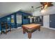 Game room with pool table, lights, and dark blue walls at 544 Two Mile Run, Johns Island, SC 29455