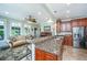 Spacious kitchen with granite countertops, stainless steel appliances, and a cozy adjacent living space at 544 Two Mile Run, Johns Island, SC 29455