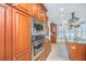 Cherry wood cabinets surround updated stainless double oven at 544 Two Mile Run, Johns Island, SC 29455