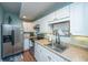 Kitchen with stainless steel appliances, granite countertops, and white cabinets at 544 Two Mile Run, Johns Island, SC 29455