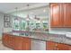 Elegant kitchen featuring granite countertops, stainless steel appliances, and an open layout with natural lighting at 544 Two Mile Run, Johns Island, SC 29455