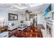 Elegant living room with hardwood floors, fireplace, and comfortable seating, perfect for relaxation and entertaining at 544 Two Mile Run, Johns Island, SC 29455