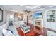 Inviting living room with hardwood floors, built-in shelving, a fireplace, and an open layout at 544 Two Mile Run, Johns Island, SC 29455