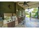 Outdoor patio with grill, ceiling fans, bar and swing, perfect for entertaining at 544 Two Mile Run, Johns Island, SC 29455