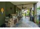 Outdoor patio with grill, ceiling fans, bar and swing, perfect for entertaining at 544 Two Mile Run, Johns Island, SC 29455