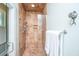 Modern shower with a glass door, tiled walls, and a rainfall showerhead for a spa-like experience at 544 Two Mile Run, Johns Island, SC 29455