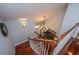 Bright foyer with hardwood staircase, chandelier, and view to formal living area at 544 Two Mile Run, Johns Island, SC 29455