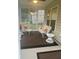 Bright sunroom with lots of natural light, comfortable seating and stylish decor at 556 Sea Foam St, Summerville, SC 29486