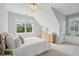 This bedroom offers a window with lush outdoor views and a charming, light-filled space at 591 Island Walk East, Mount Pleasant, SC 29464