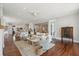 Open-concept floor plan with hardwood flooring connecting the kitchen and living spaces at 591 Island Walk East, Mount Pleasant, SC 29464
