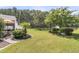 Large, well-maintained backyard with beautiful landscaping and tranquil water feature at 602 Eastern Isle Ave, Summerville, SC 29486