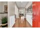 Welcoming foyer with hardwood floors, wainscoting, and a view into the living spaces at 602 Eastern Isle Ave, Summerville, SC 29486