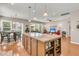 Open-concept kitchen seamlessly flows into a dining and living area, great for gatherings with Gathering and friends at 602 Eastern Isle Ave, Summerville, SC 29486