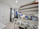 Bedroom features a bunk bed with a desk, pillows, and window with natural light at 602 Jancus St, Charleston, SC 29414
