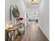 Bright hallway showcasing stylish decor, modern lighting, and seamless flow into the inviting living space at 602 Jancus St, Charleston, SC 29414